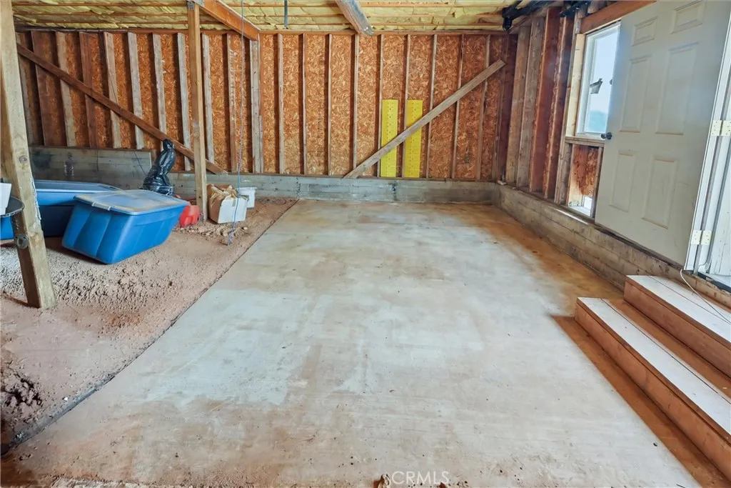storage area under house - items digitally removed