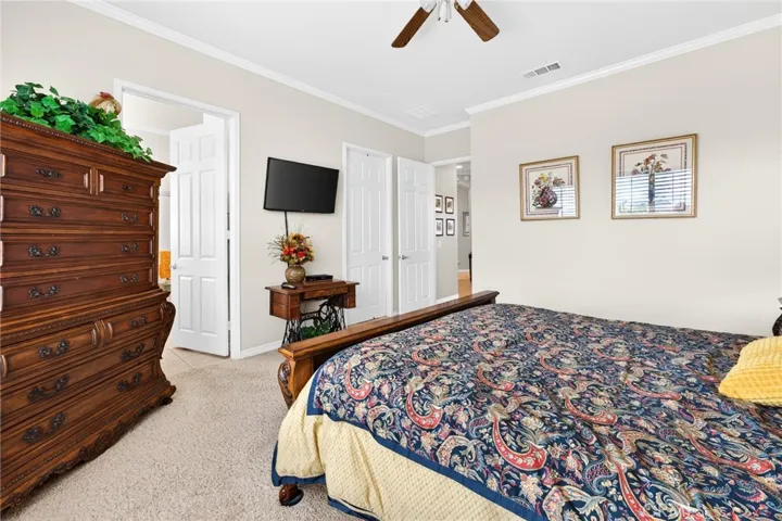 Primary Bedroom Entrance with Doorways to Primary Bath and Huge Walk-in Closet
