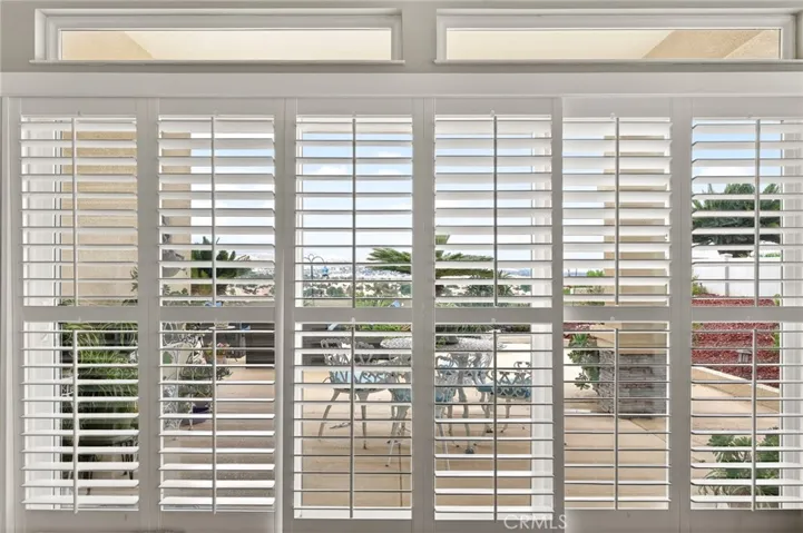 Slider with Sliding Plantation Shutters in Great Room