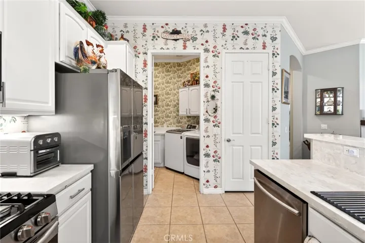 Pantry Door is to the right and Laundry Room entrance is to the Left