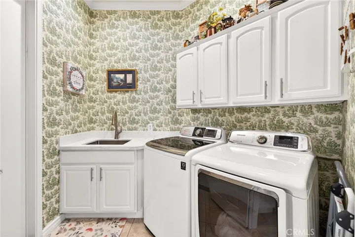 Laundry Room with Quartz Countertops for Sink, Upgraded Cabinets and Washer/Dryer Included