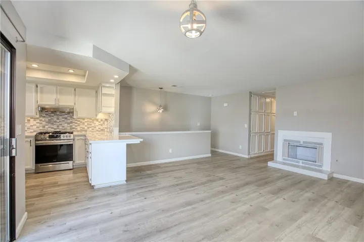Fireplace has been upgraded since photos