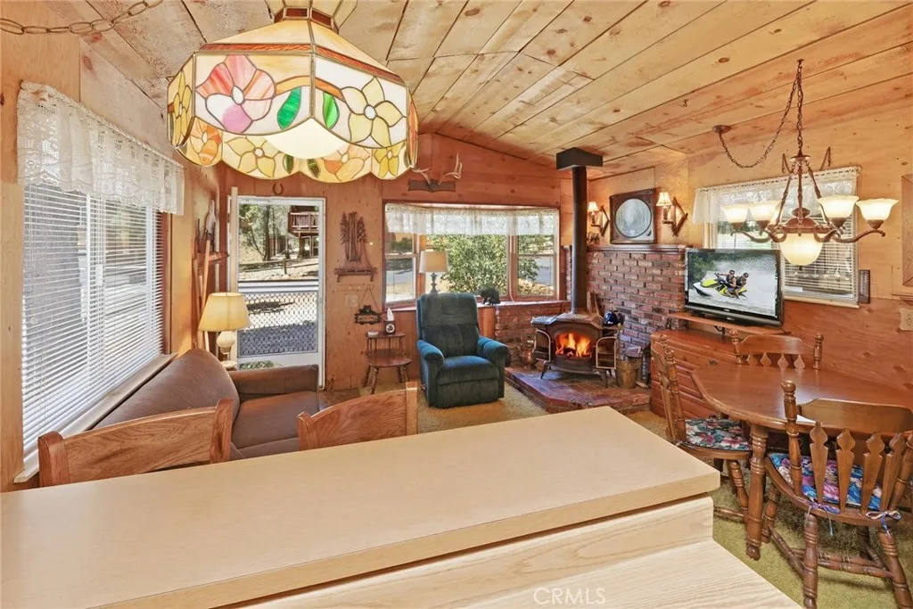 Large Bay window in living room fills the space with light.