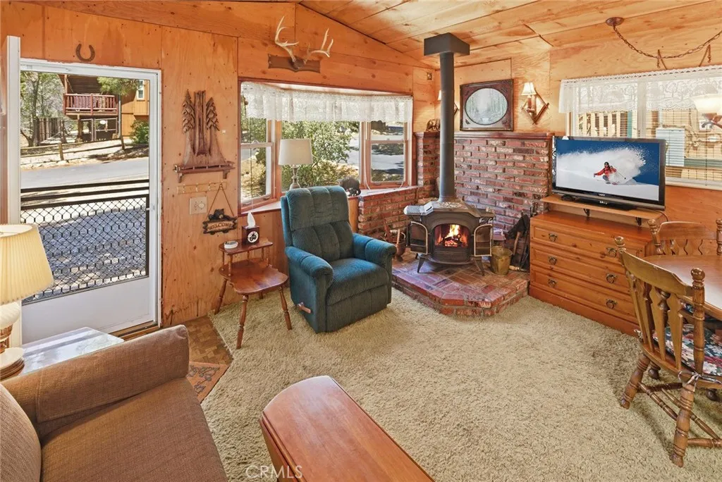 Virtually Enhanced - Wood burning stove in the living room.