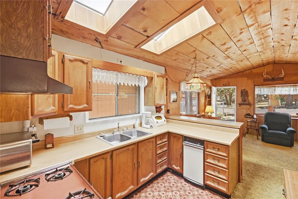 Wood paneled walls and ceiling.