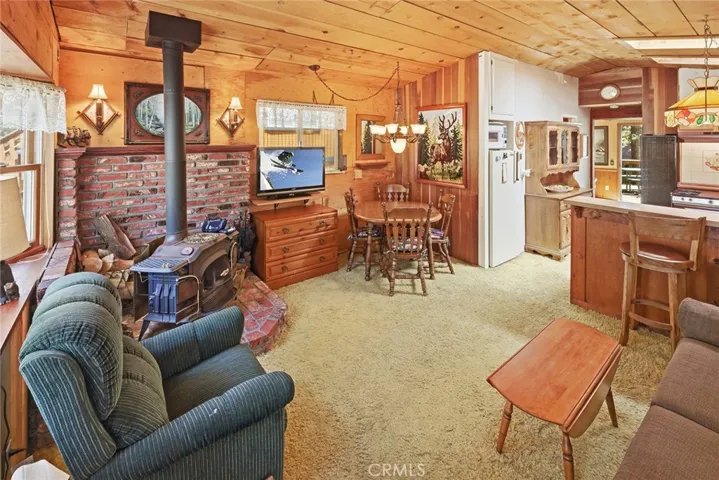 Dining area located in living room.