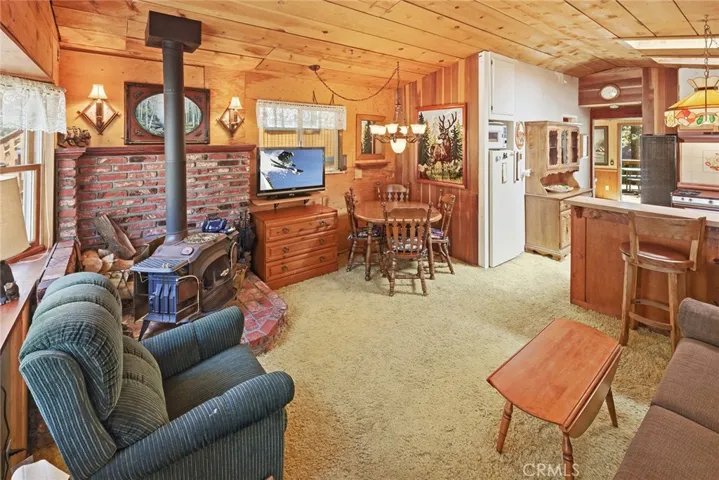 Dining area located in living room.