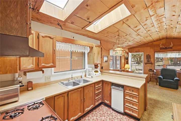 Wood paneled walls and ceiling.