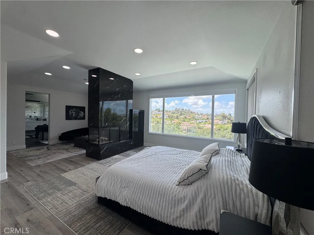 Primary bedroom with double sided Fireplace