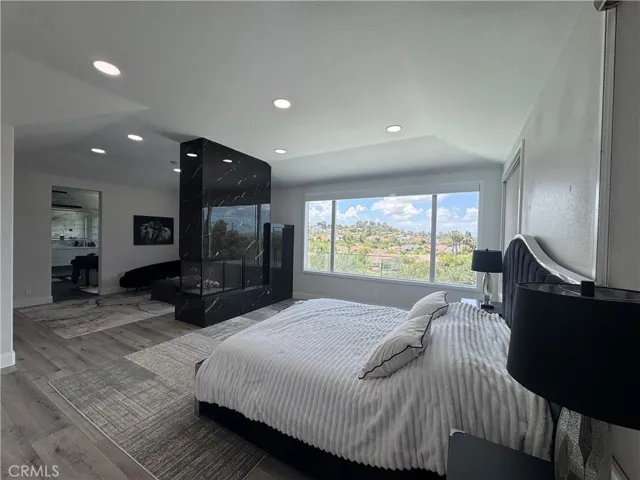 Primary bedroom with double sided Fireplace