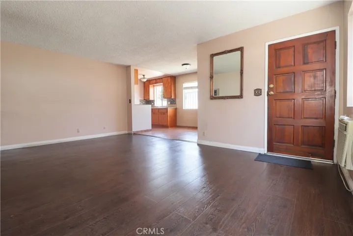 Unit #481: Living Room view to Dine Area and Kitchen