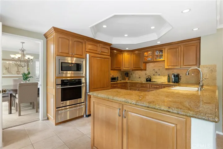 Kitchen with stainless appliances and granite countertop!