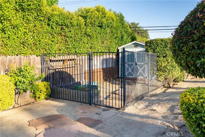 Fenced storage or possible Dog Run?