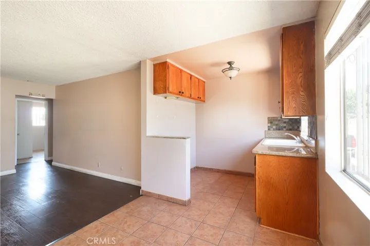 Unit # 481: Dine Area & Kitchen.