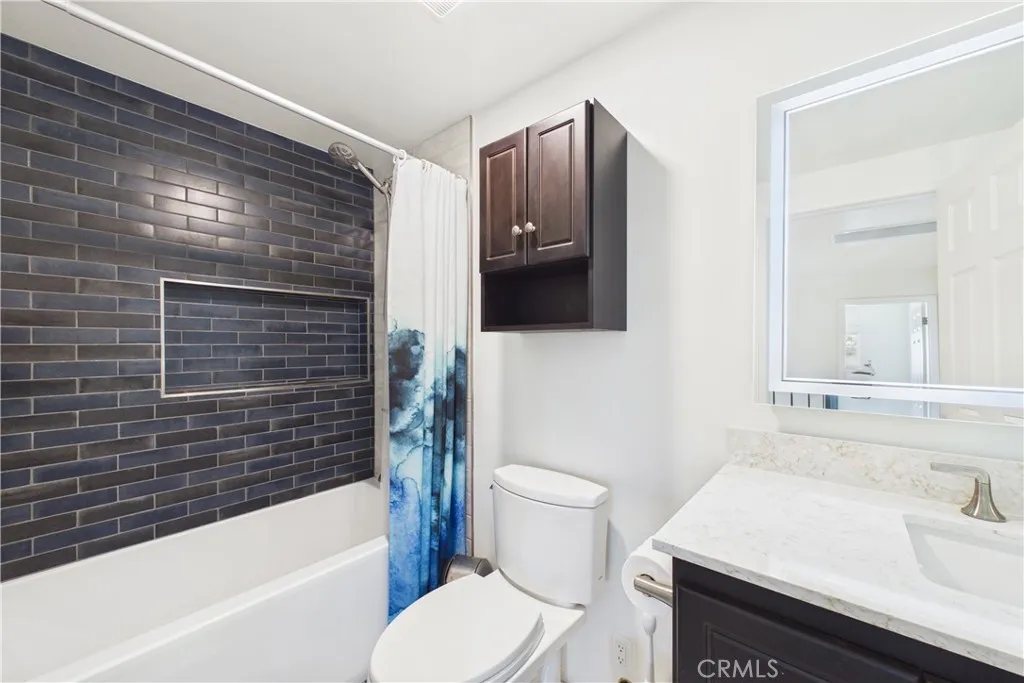 Tiled shower with an oversized shampoo box