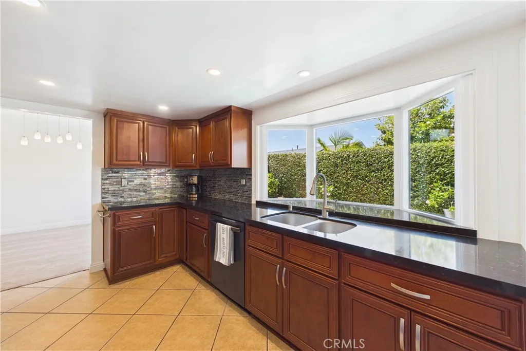 Stunning views of the backyard through the large bay window
