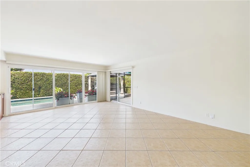 The slider on the right allows direct access to the screened in patio on the East side of the home