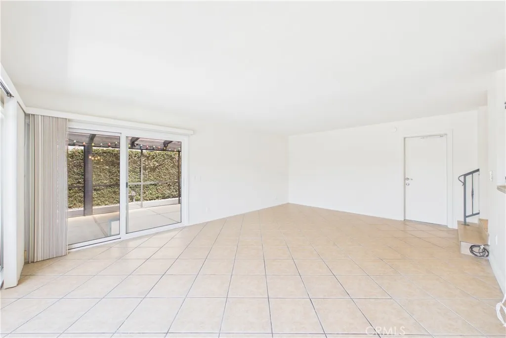 Unaltered original. Family room directly off of the kitchen with direct access to the 3-car garage