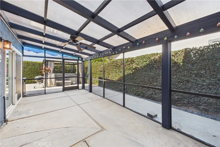 Screened in patio to the east of the home, great for outdoor summer nights