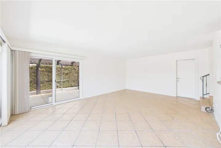Unaltered original. Family room directly off of the kitchen with direct access to the 3-car garage