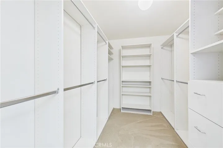 Large walk-in closet with organizers