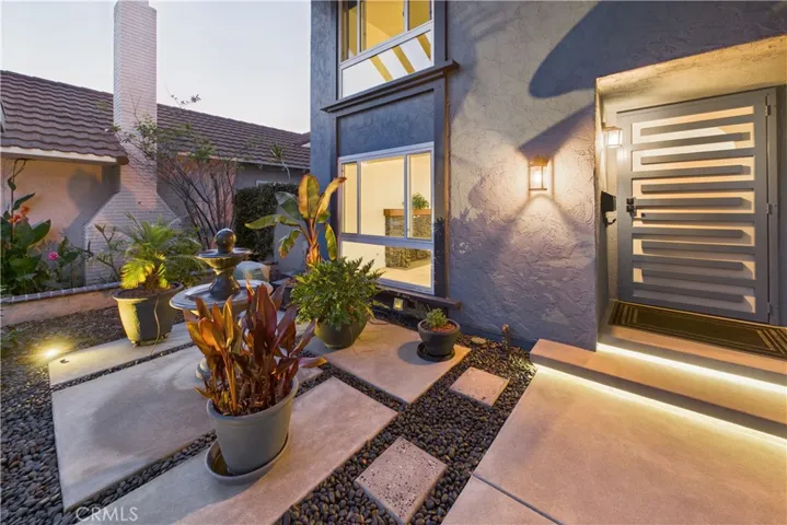 Private courtyard with a bubbling fountain