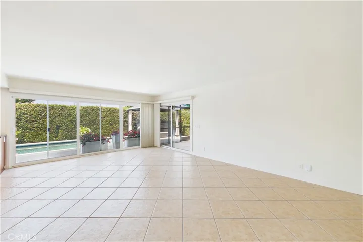 The slider on the right allows direct access to the screened in patio on the East side of the home