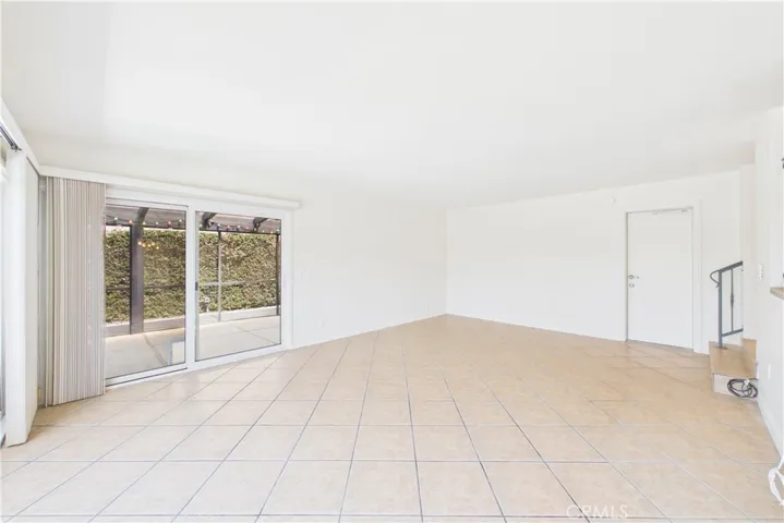 Unaltered original. Family room directly off of the kitchen with direct access to the 3-car garage