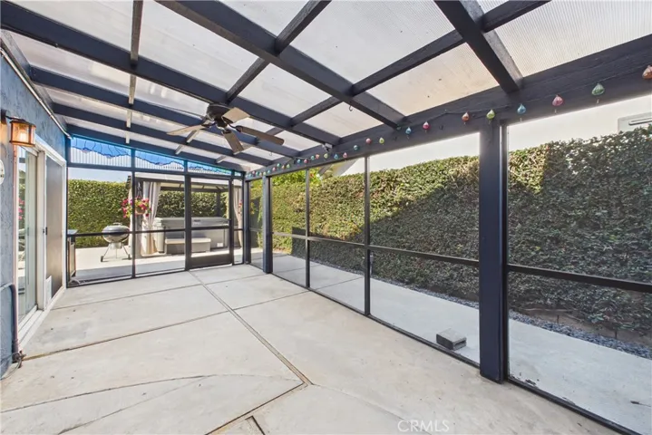 Screened in patio to the east of the home, great for outdoor summer nights