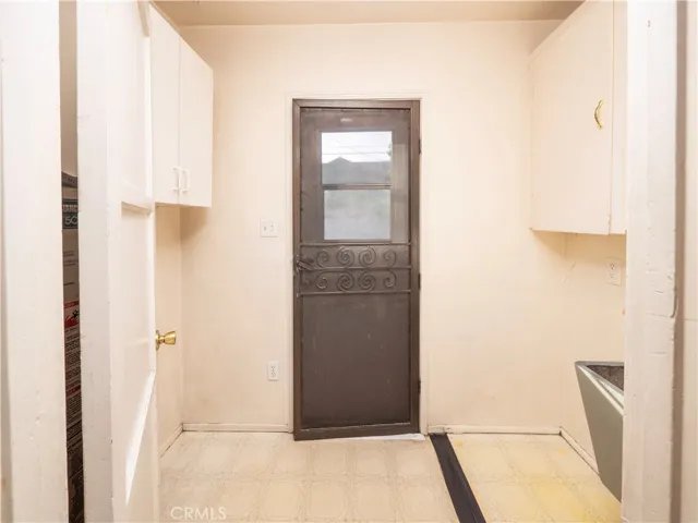 laundry-room door leading to the back yard