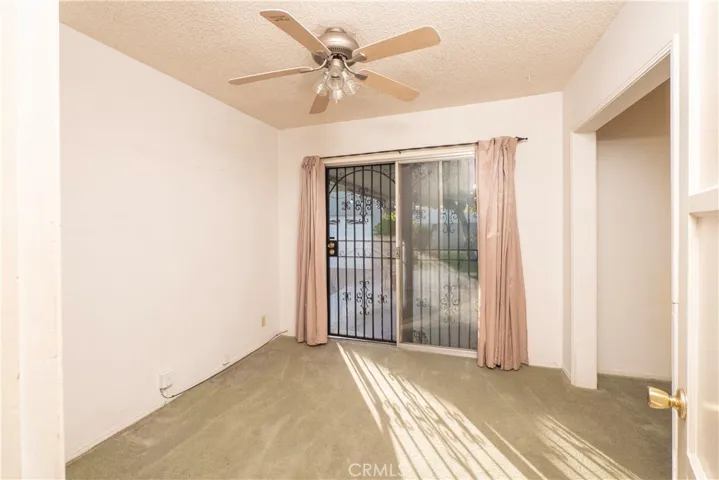 bedroom number 4 showing sliding door to back patio