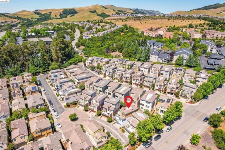 Contemporary residential community featuring multi-story homes with varied architectural facades