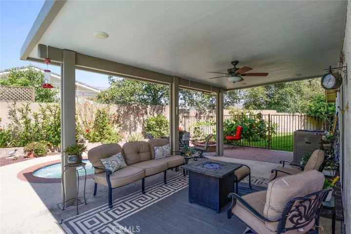 Imagine hours of relaxation in solitude or sharing good times with guests under this maintenance free covered patio