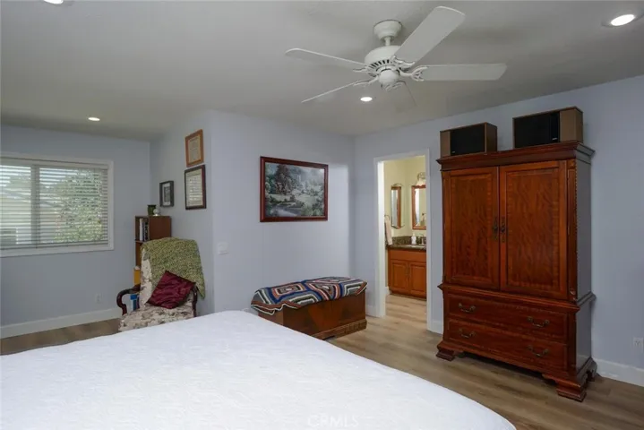 Additional view of primary suite leading to bath/vanity area and large walk n closet