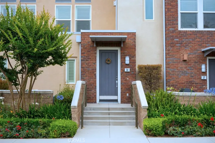 Inviting private entry with charming curb appeal and beautifully maintained landscaping.