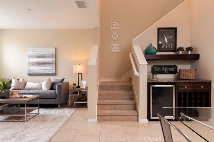 Cozy fireplace adds warmth and ambiance, making the great room ideal for relaxing evenings at home.