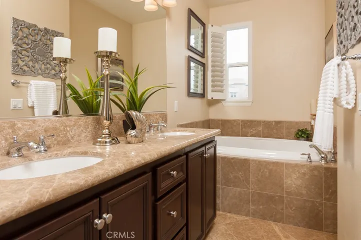 Spa-inspired primary bath creates a relaxing retreat with upgraded finishes and generous space.