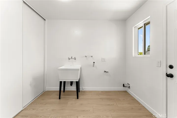 Laundry room and additional storage /pantry on the left