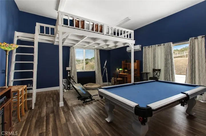 Game room with sleeping loft and private entrance.
