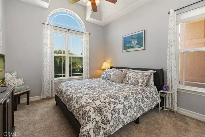 Secondary bedroom with ceiling fan