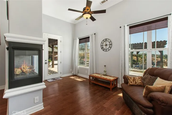 Retreat, dual sided fireplace and private entrance in primary bedroom