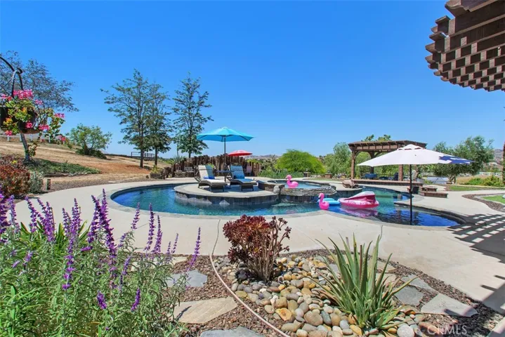 Stunning poolside Oasis designed for relaxation & entertaining