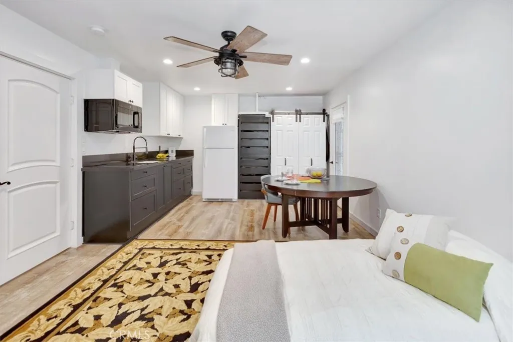  with full bath, closets and extra sink and food preparation, refrigerator for private guests, extended family and expanded entertaining space, if desired.