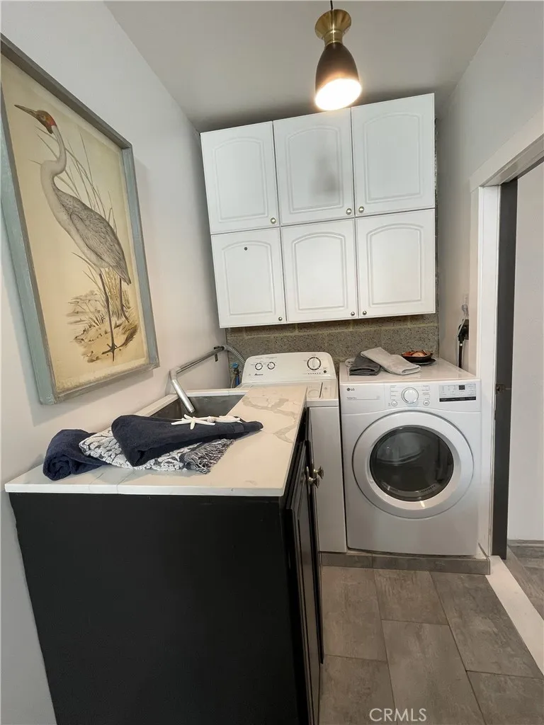 GALLERY - GARAGE MULTI-USE FLEX SPACE includes full-sized laundry and utility sink.