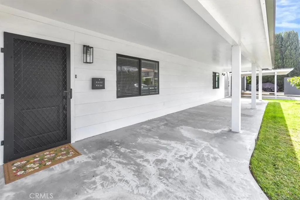 Expansive front veranda and wraps around home creating options for indoor-outdoor living and entertaining on this large multi-purpose home and compound.