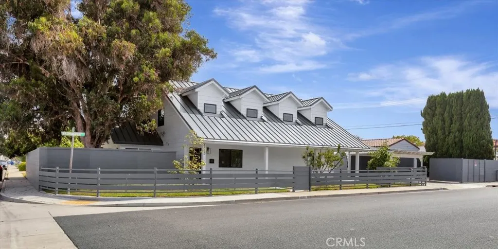 Ahhhh, smell the eucalyptus evoking the memories of the ode of a custom-built Australian Farmhouse with white HardiPlank siding and metal roofing. Customized industrial features of gates and fending surrounding home features.