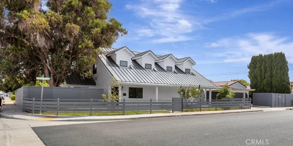 Ahhhh, smell the eucalyptus evoking the memories of the ode of a custom-built Australian Farmhouse with white HardiPlank siding and metal roofing. Customized industrial features of gates and fending surrounding home features.