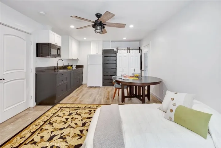  with full bath, closets and extra sink and food preparation, refrigerator for private guests, extended family and expanded entertaining space, if desired.