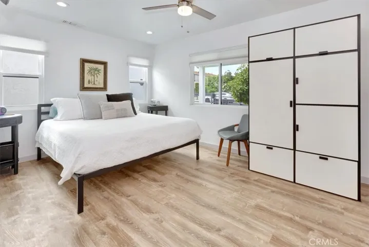 Downstairs end of hall bedroom with full wall (not pictured) of closet with sliding doors.