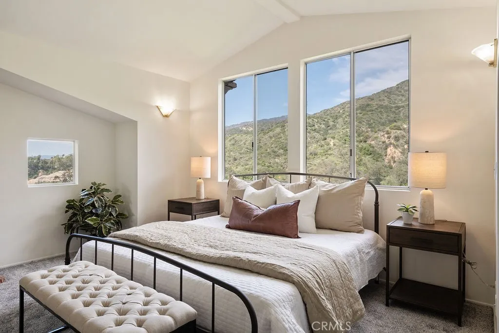 Fabulous primary bedroom with a gorgeous view